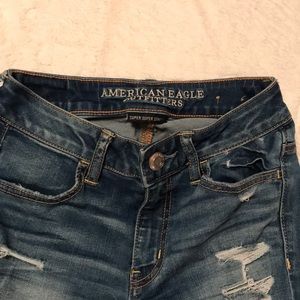 Distressed denim jeans